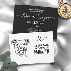 a wedding card with an image of a dog on it next to a pocket watch