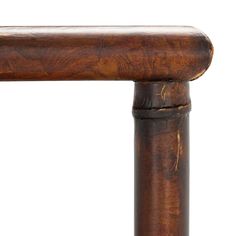 a close up of a wooden rail on a white background