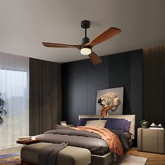 a bed room with a neatly made bed and a ceiling fan