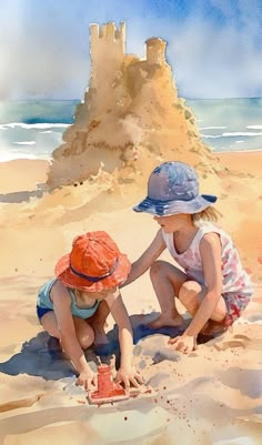 two children playing in the sand at the beach