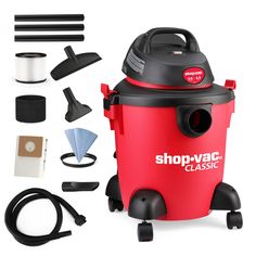 the shop vac is set up with all its accessories