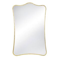 a white and gold framed mirror on a wall