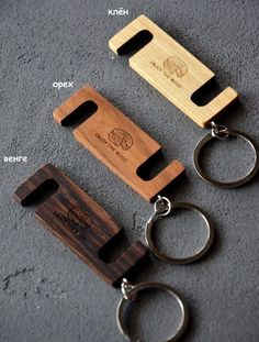 three different types of wooden key chains