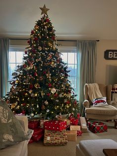 a decorated christmas tree in a living room