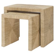 two wooden stools sitting next to each other