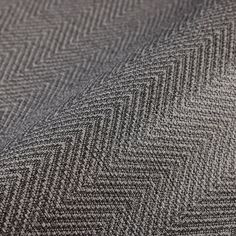 a close up view of a grey herringy fabric