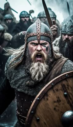 a group of men with beards and helmets on in the middle of a battle