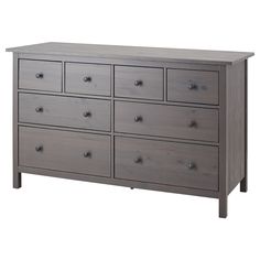 a large gray dresser with six drawers