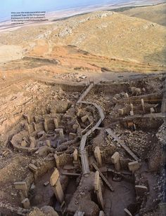 an aerial view of the ruins and road