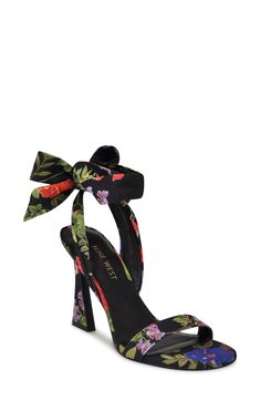 An ankle tie furthers the sweetness of a floral-patterned sandal lofted by an architectural heel for on-trend styling. 3 3/4" heel Textile upper/synthetic lining and sole Imported Spring High Heel Sandals With Wrapped Heel, Synthetic Ankle Tie Lace-up Sandals For Summer, Summer Evening Lace-up Sandals With Heel Strap, Adjustable 4-inch Heel Summer Sandals, Elegant Ankle Wrap Lace-up Sandals For Spring, Formal Summer Lace-up Sandals With Block Heel, Summer Lace-up Sandals With 4-inch Heel And Ankle Strap, Spring Formal Lace-up Sandals With Ankle Tie, Spring Formal Lace-up Ankle Tie Sandals