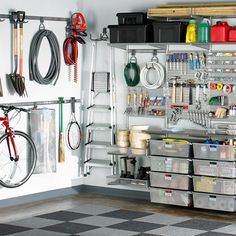 an organized garage storage area with lots of tools and supplies on the wall above it