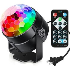 an image of a disco ball with remote control on the side and color changing light