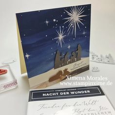 a christmas card with the word merry written on it and some other items around it