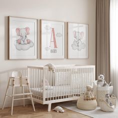 a baby's room with three framed pictures on the wall