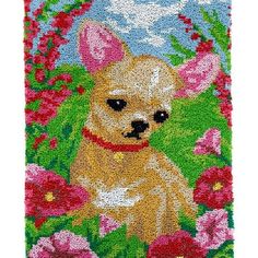 a door mat with a small dog in the grass and flowers on it's side