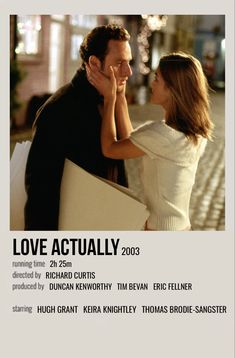 the poster for love actually is shown with a man holding a woman's head