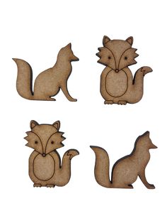 four wooden cutouts of different types of animals