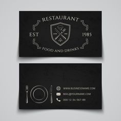 a restaurant business card with a fork and knife in the middle, on a dark background