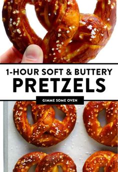 the pretzels are being held up to be eaten