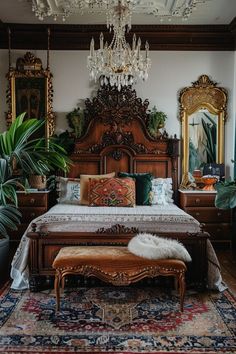 a bedroom with an ornate bed, chandelier and rug on the floor in front of it