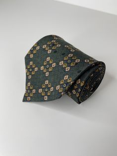 "Vintage Brioni tie Made in USA Length: 60\" Width: 4\" Material: 100% Silk" Patterned Standard Tie For Formal Occasions, Standard Silk Mark Certified Ties For Black Tie Events, Silk Mark Certified Standard Tie For Black Tie Events, Silk Mark Certified Ties For Black Tie Events, Classic Patterned Suit And Tie Accessories For Black Tie, Patterned Ties For Black Tie Occasions, Silk Mark Certified Ties For Business, Patterned Tie For Black Tie Events, Classic Patterned Ties For Black Tie Events