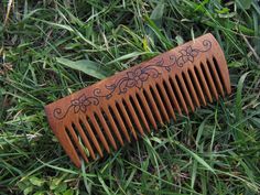 Handmade hair comb. 90 years old Acacia wood. Finish - linseed oil Measurements: 4.88in - 1.77in (12,4cm - 4,5cm) Metal and other hard objects can damage and scratch the products Keep away from your pet  How to take care of the wooden and horn combs: Our combs can be used on damp hair and beard but do not leave the comb exposed to water for long periods of time. Dry the damp comb with a cloth. Do not use a dryer or another electrical appliance. Do not heat, there is a risk of fissures in the woo Wood Hair Comb, Filigree Tattoo, Wood Comb, Wooden Comb, The Horn, Wood Carving Art, Bone Carving, Linseed Oil, Wood Shop