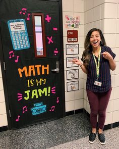 a woman standing in front of a door that says math is my jam