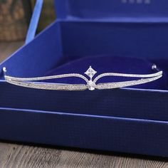 PRODUCT DETAILS:Material:Copper alloy,AAA cubic zirconiaSize:13cm*2.5cm HeightOccasions:Wedding, Party, Engagement, Photo ShowThis Tiara is only 13cm Width*2.5cm Height.Please check carefully before ordering. Thank youThe box in the description is only for show, not included with the product. Wedding Tiara Headband, Tiara Wedding Hair, Headband Crown, Pageant Crowns, Tiara Headband, Queen Princess, Crown Bridal, Headpiece Jewelry, Diamond Tiara