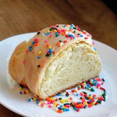 a donut with sprinkles is on a plate