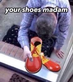 a man in plaid shirt and red shoes with yellow bow tie pointing at shoelaces