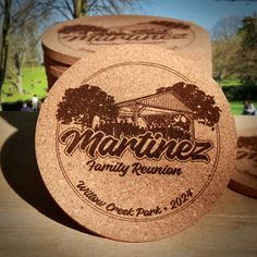 three cork coasters with the name marine family reunion printed on them sitting on a table