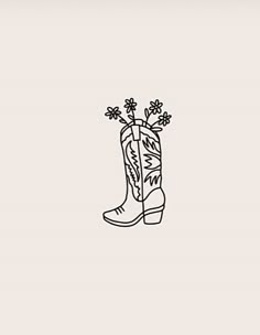 a black and white drawing of a cowboy boot with flowers in it's boots