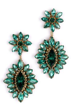 Exude extreme sparkle in these tonal crystal drop earrings anchored by floral clusters sure to make a glamorous statement. 2" drop, 1" width Post back Steel post back Goldtone plate/leather/glass/cotton Imported Glamorous Green Crystal Earrings For Party, Glamorous Green Jeweled Earrings, Affordable Green Statement Crystal Earrings, Luxury Green Gemstone Bridal Earrings, Green Cubic Zirconia Dangle Crystal Earrings, Deepa Gurnani, Anniversary Jewelry, Crystal Drop Earrings, Crystal Drop