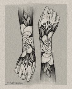 two hands with flowers and leaves on them