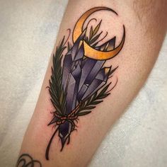 a tattoo on the arm of a person with an arrow