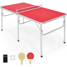 a ping pong table with two paddles next to it