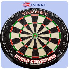 a black and white dart with the words champion written in red, green and blue on it