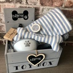 a dog toy box with personalized items in it