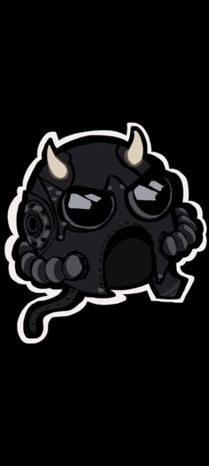 a black sticker with horns on it's head and eyes, sitting in the dark