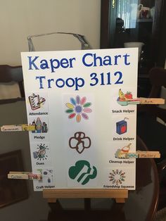 a sign with stickers on it that says kaper chart troop 31i2