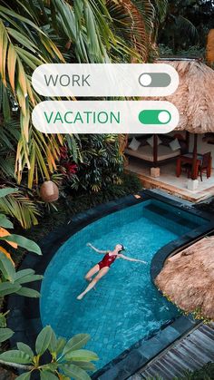 a woman swimming in a pool surrounded by palm trees