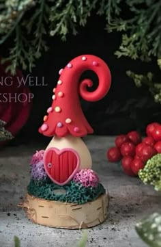 a cake shaped like a mushroom on top of a table