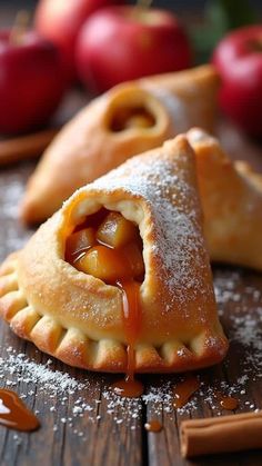 apple pies with caramel filling on a wooden table