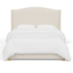 the headboard and foot board of a bed with white linens, made in an upholstered style