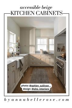 the kitchen cabinets are all white and have brown trim on them, while the floor is made of wood