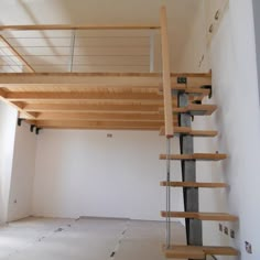 an empty room with some stairs in it