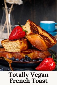 Slices of vegan french toast are stacked on top of each other on a dark blue plate. Fresh strawberries and blueberries are on the plate next to the french toast. A cup of coffee is blurred in the background. Text on the image reads, "totally vegan french toast". Easy Vegan French Toast, Food Recipes Quick, Vegan French Toast, Vegan French, Vegan Christmas Recipes, Recipes Ground Beef, Chicken Recipes Easy, Plant Based Breakfast, Vegan Christmas