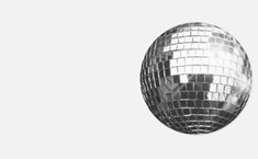 a shiny disco ball on a white background