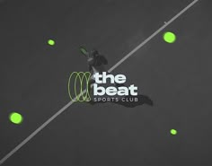 the beat sports club logo on a tennis court with green balls in the air above it