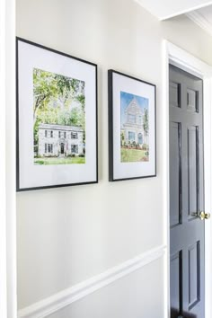 two framed pictures hang on the wall next to a door in a home's entryway